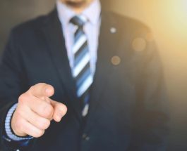 close up photo of a person wearing suit jacket