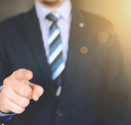 close up photo of a person wearing suit jacket