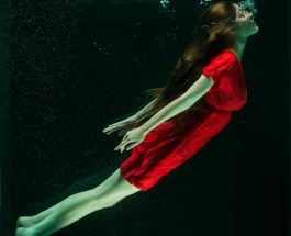 woman wearing red dress