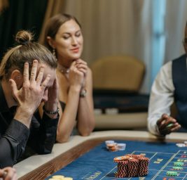 a person loosing his bets in roulette table